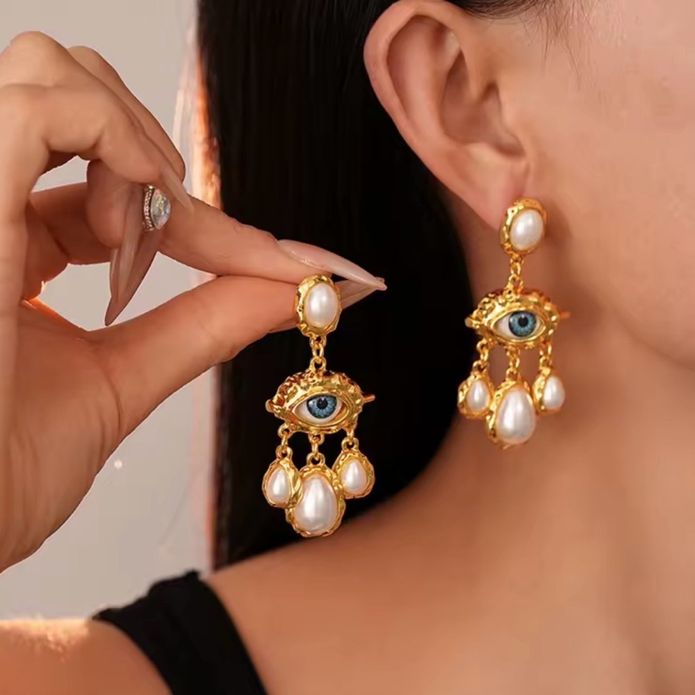 Elegant Surrealist Gold and Pearl Eye Drop Earrings